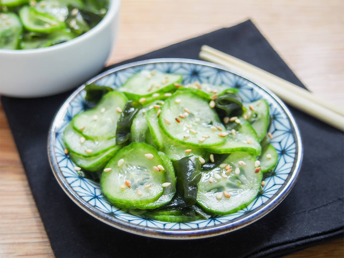 side view of plate of Japanese cucumber salad, sunomono.