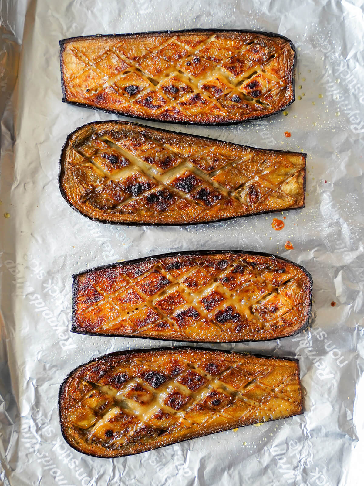 miso glazed eggplant, nasu dengaku, just out the oven on foil lined baking sheet.