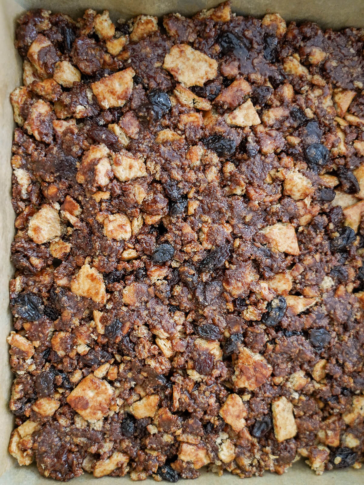 biscuit/cookie base pressed into lined baking tin.