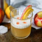 glass of apple whiskey sour.