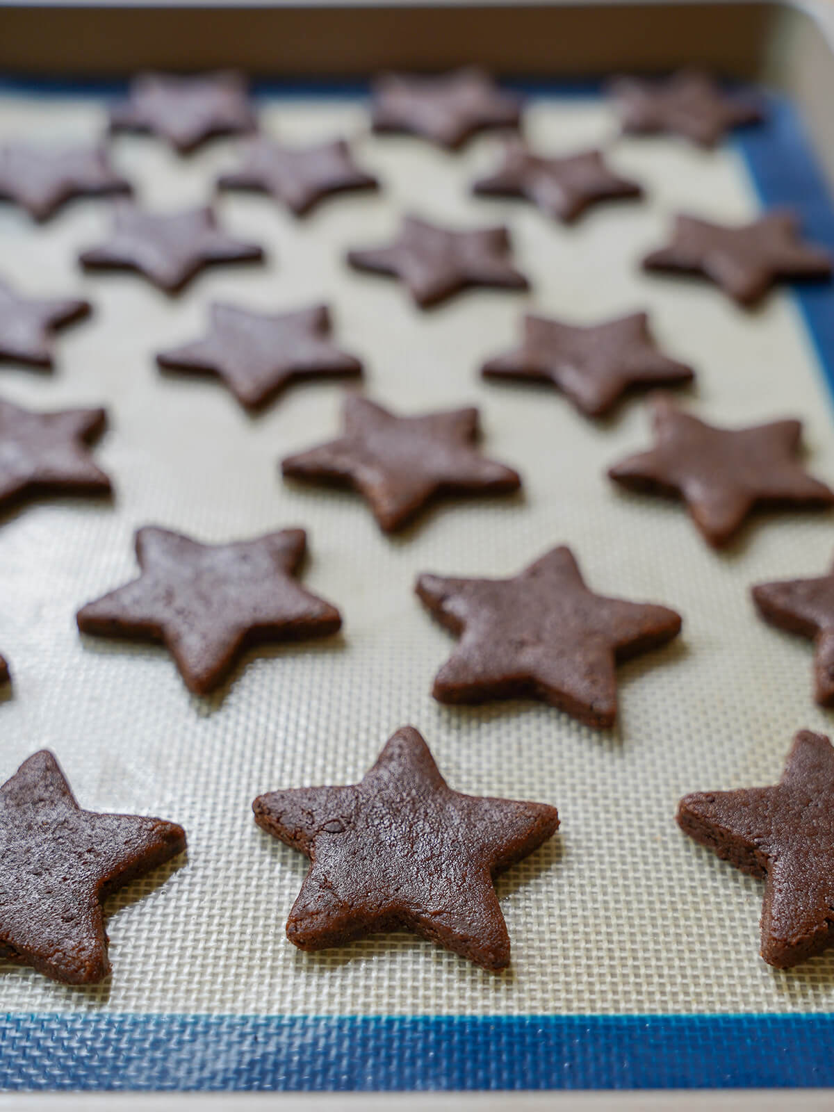 star shaped cookies on baking sheet before baking.