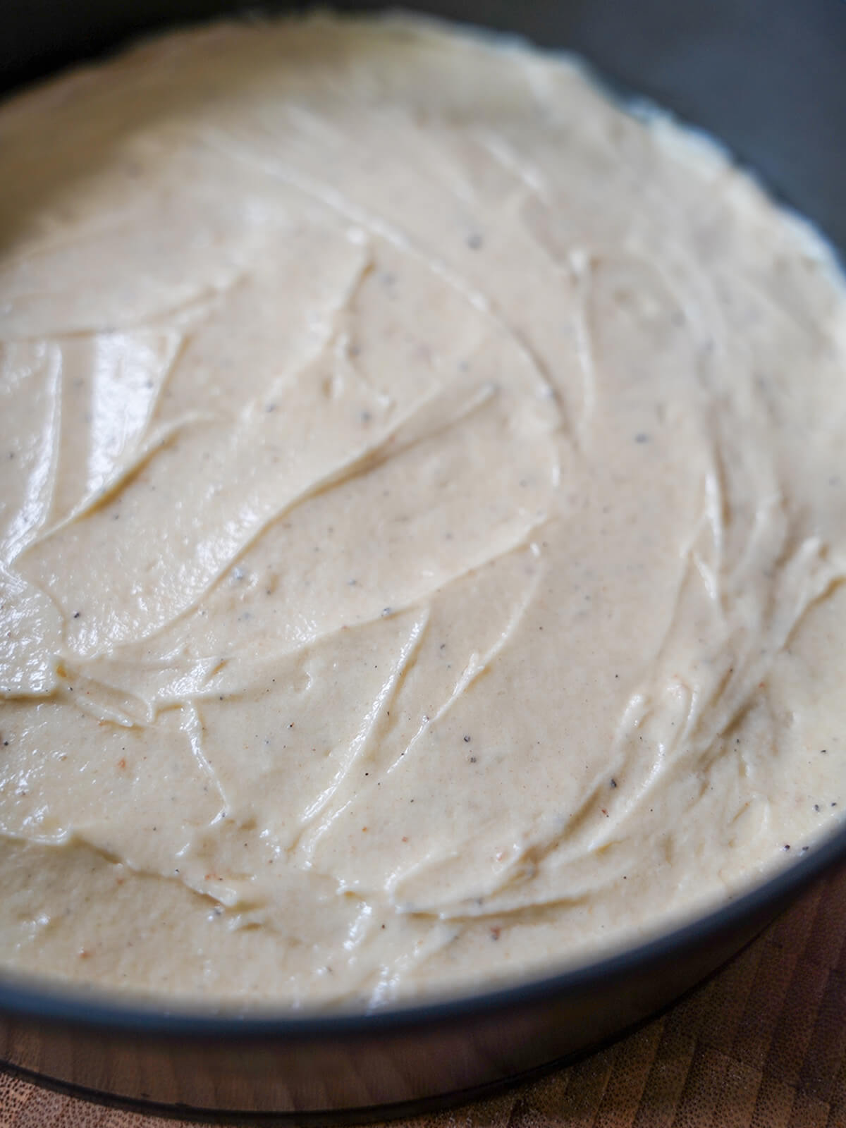 cake butter in tin with top smoothed over.
