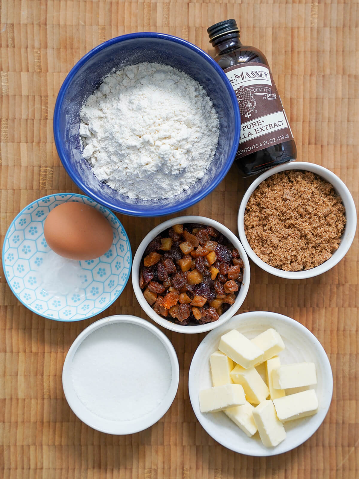 bowls of flour, mincemeat, sugars, butter and egg from overhead.