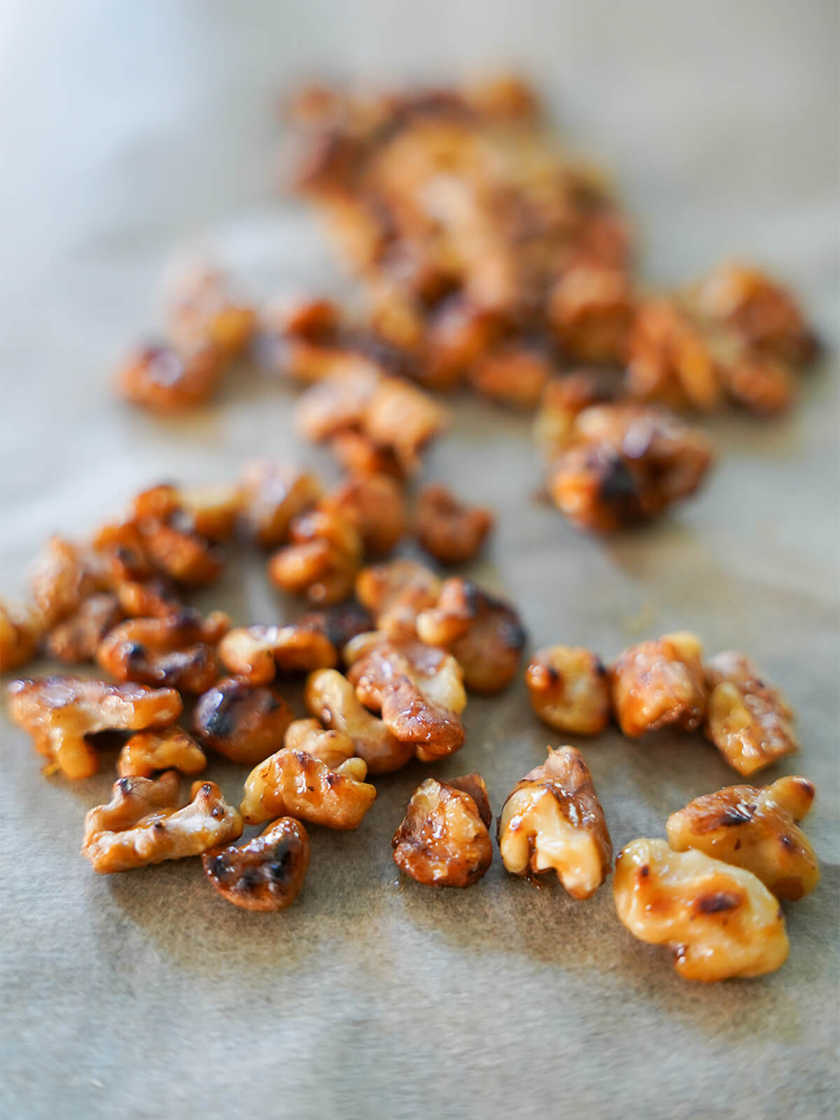walnuts for halloumi pomegranate salad candied walnut pieces on parchment