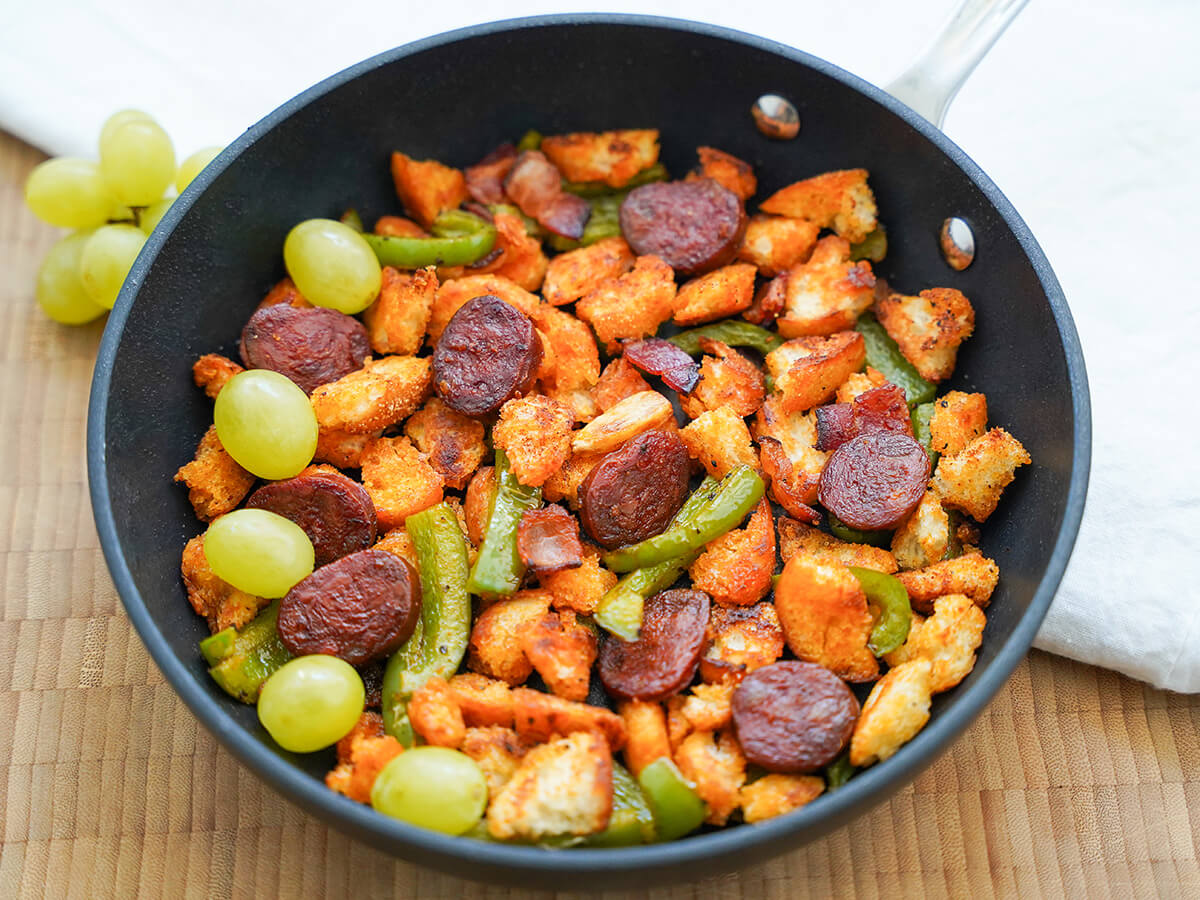 side view of Spanish migas in skillet.