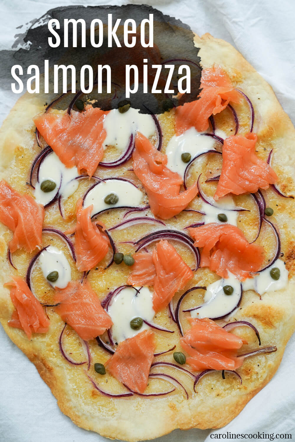 This smoked salmon pizza is a simple, tasty combination of a crisp base topped with delicate smoked salmon, creamy creme fraiche and a scatter of onion and capers. It's easy, flavorful and versatile when you serve it. This smoked salmon pizza is a simple, tasty combination of a crisp base topped with delicate smoked salmon, creamy creme fraiche and a scatter of onion and capers. It's easy, flavorful and versatile when you serve it.