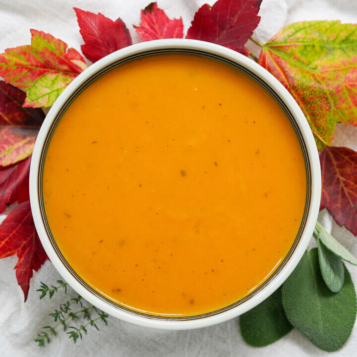 bowl of butternut squash apple soup from overhead.