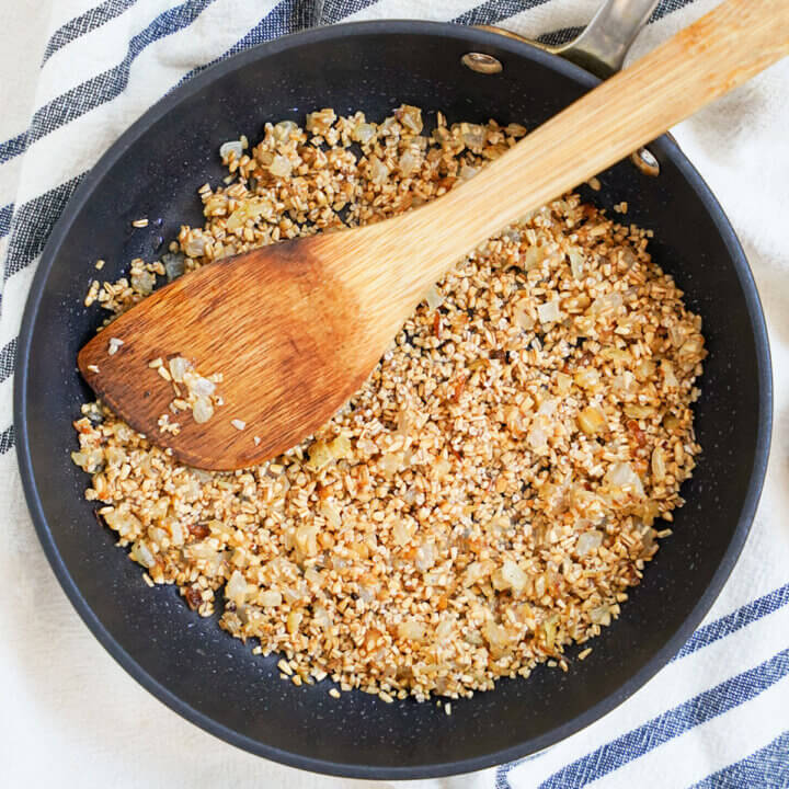 overhead view of skillet of skirlie oatmeal stuffing.