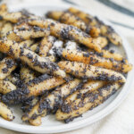 side close up view of plate of Mohnnudeln, poppy seed potato noodles.